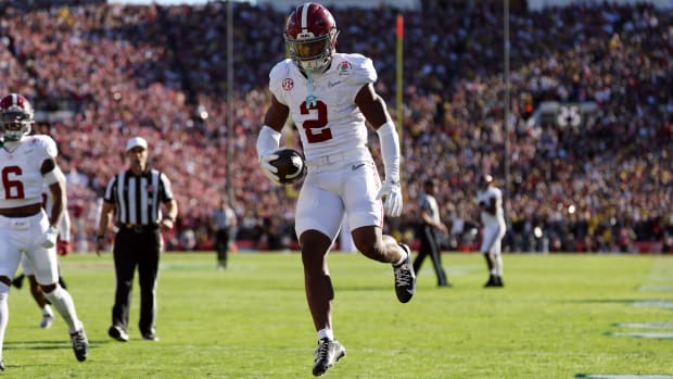 Alabama Crimson Tide defensive back Caleb Downs (2) celebrates after coming up with an interception in the first quarter of the Rose Bowl game against Michigan.